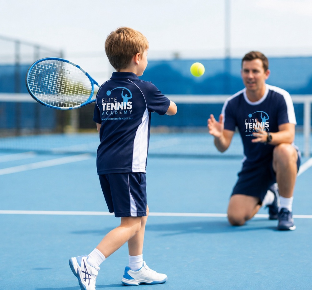 A coach helping a junior player on court